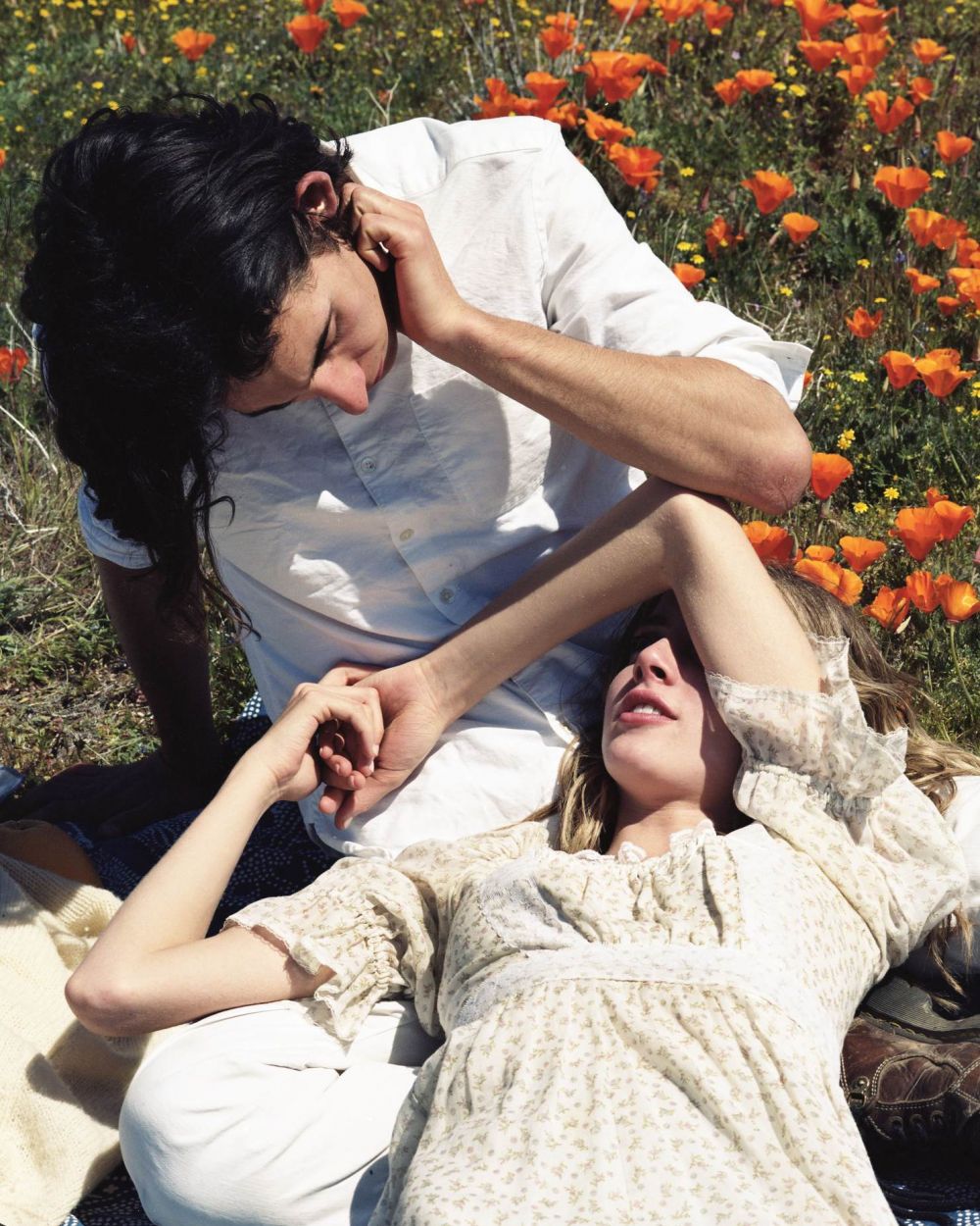 VERVE Fayetteville girl sitting in car smiling while taking a bit of pizza